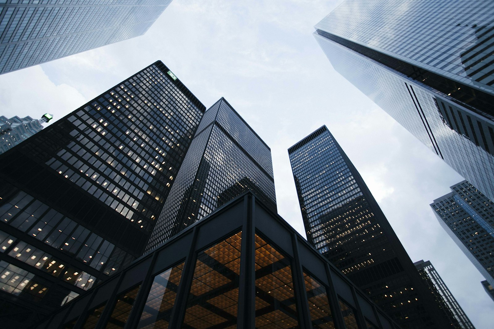 A branded luxury real-estate website shown on desktop and mobile